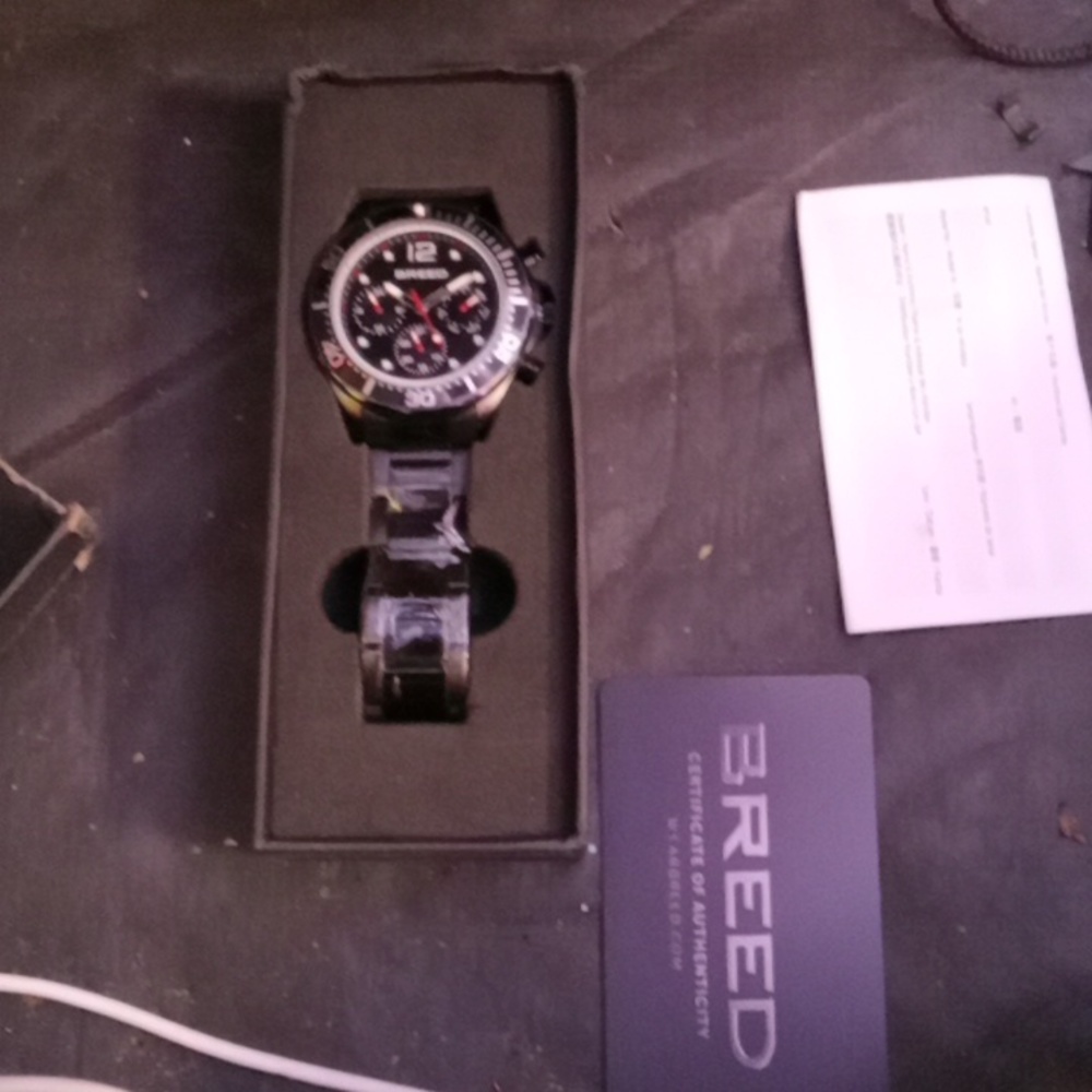 All New Breed all black face,bezel,and band.Stainless Steel.Ret.$250 Thank you